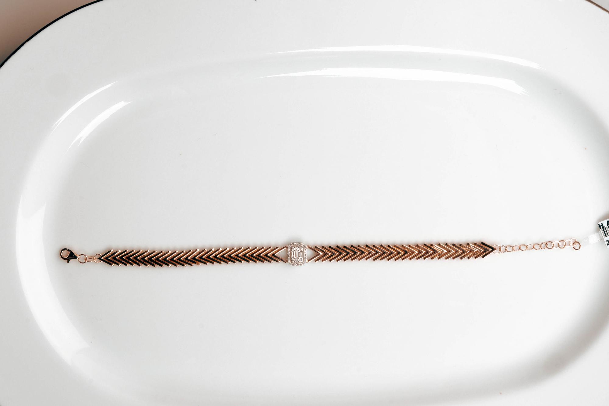Close detail of metallic thread satin stitch